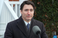 Canadian PM to step down while opposition complains 