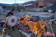 Rescue teams recover valuables in quake-hit zone in Xizang