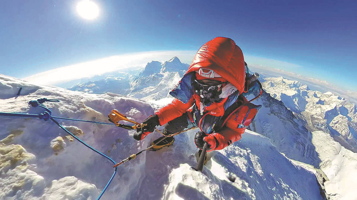First man with AS scales world's highest mountain