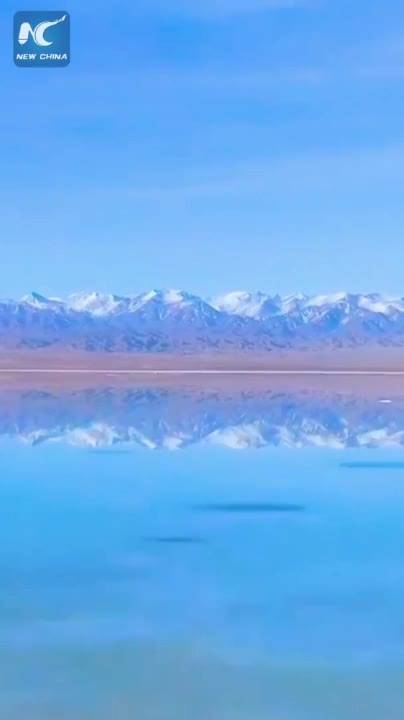 Nature's spectacle: Mirror-like salt lake in NW China