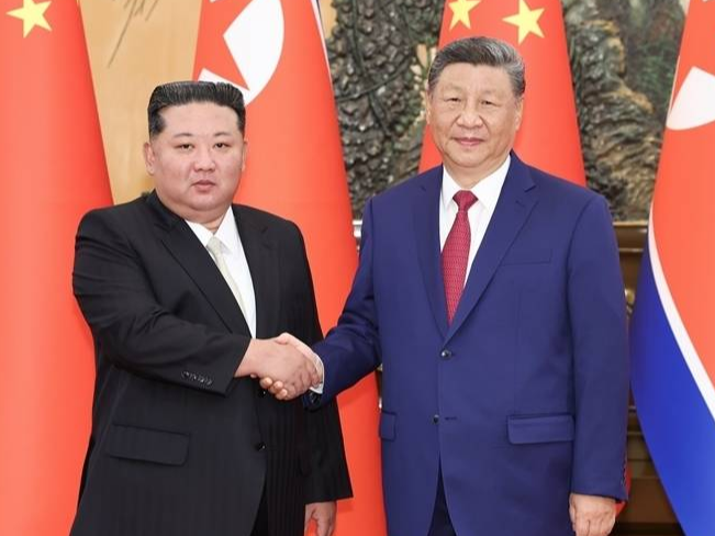 习近平同朝鲜劳动党总书记、国务委员长金正恩举行会谈