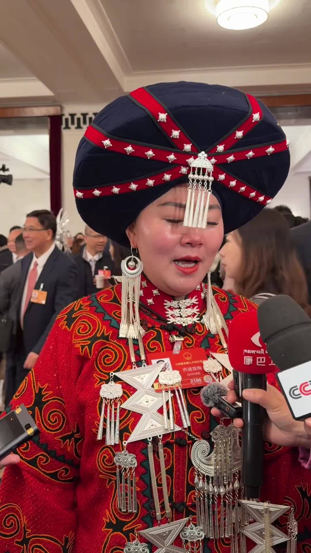 Qiaojin Shuangmei, a deputy to the 14th National People's Congress, said she paid more attention to intangible cultural heritage items