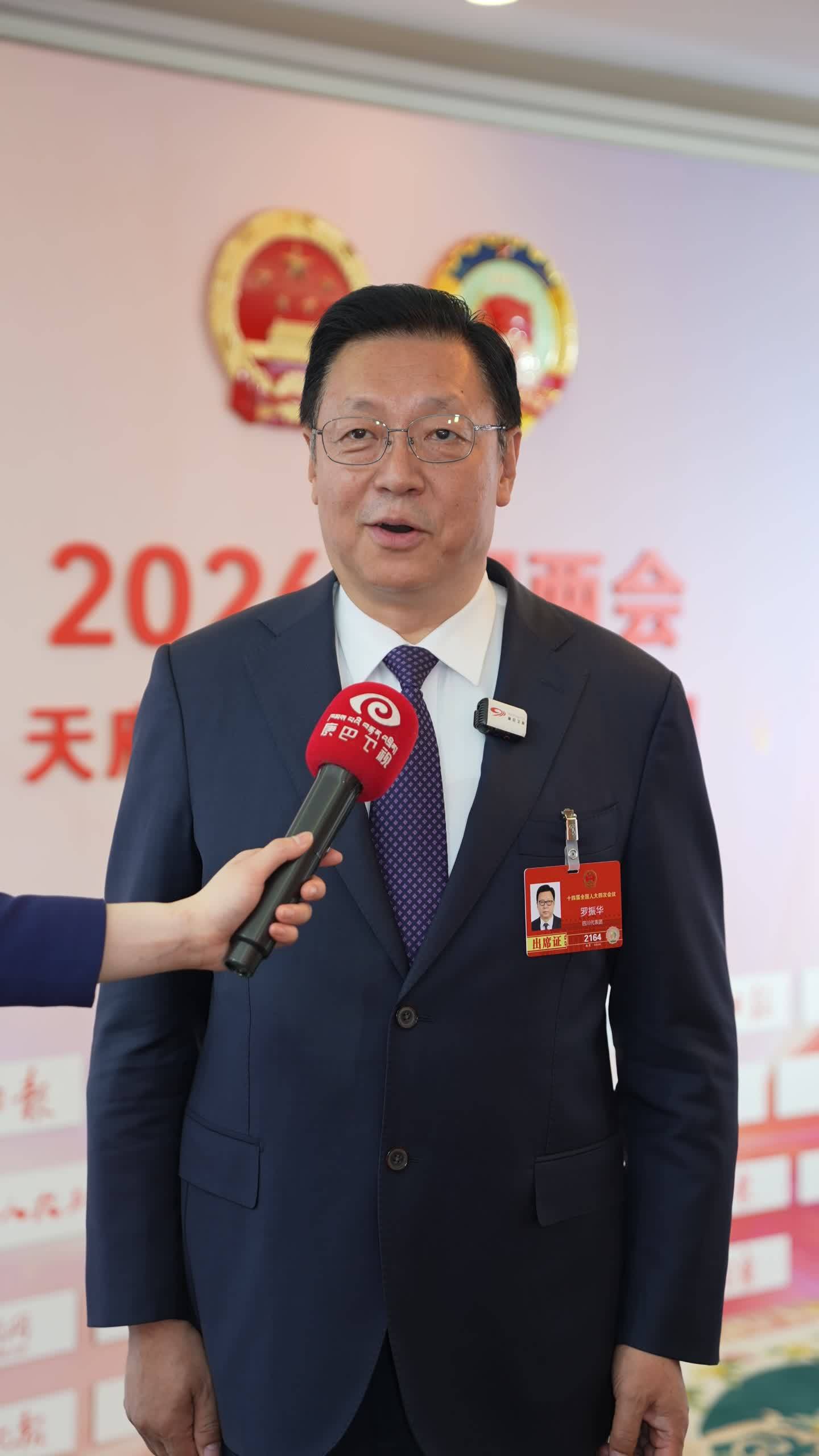 Luo Zhenhua, a deputy to the 14th National People's Congress, said ecological initiatives will show the beauty of Aba to the world