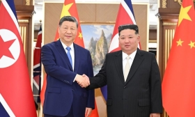 习近平同金正恩举行会谈
