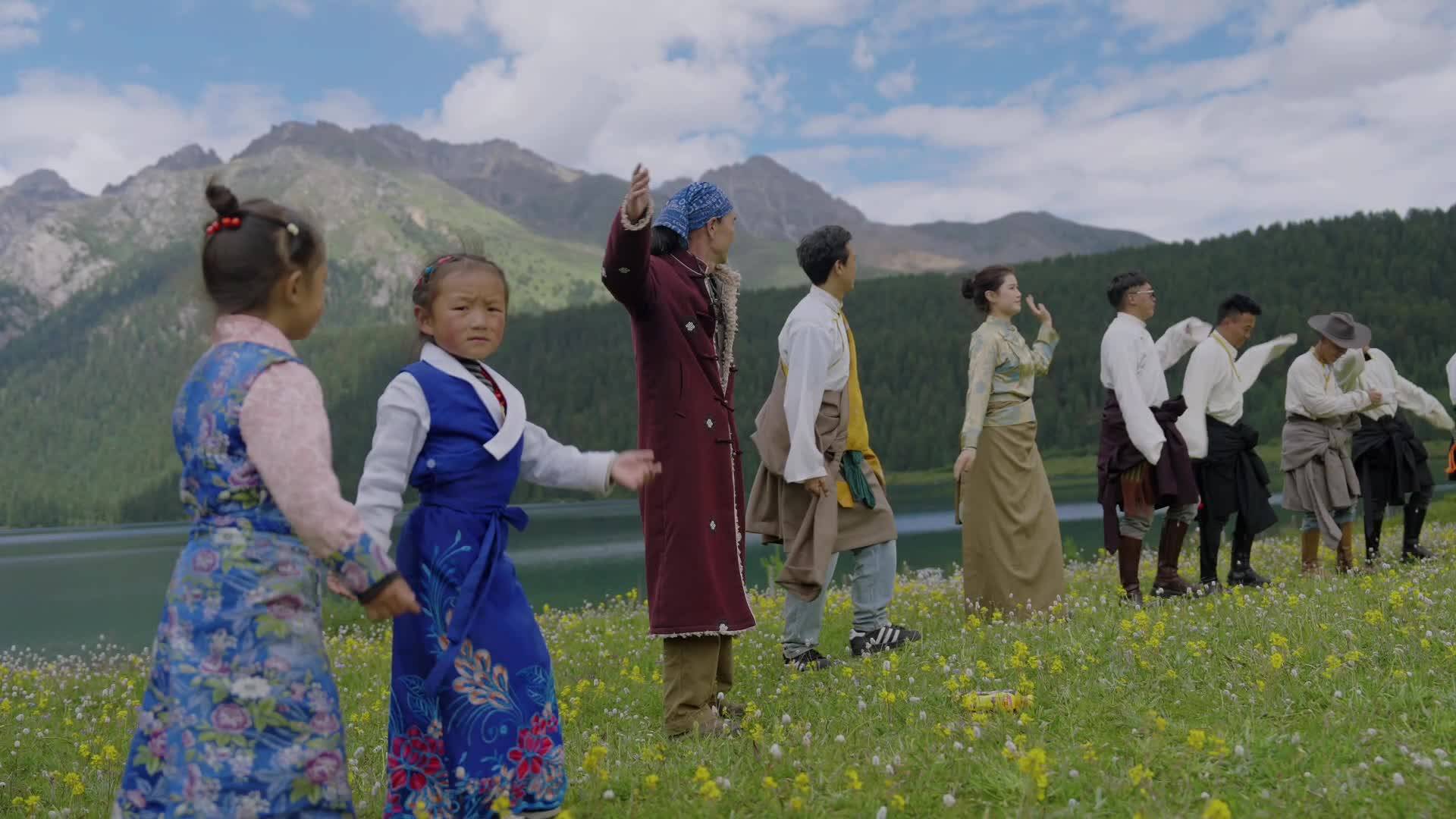 Locals gathered for a traditional Guozhuang dance with the stunning nature landscape as their backdrop inBathang County