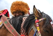 A village's transformation at foot of sacred mountain