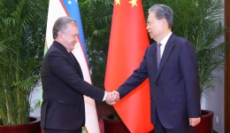 China's top legislator meets Uzbek president, Antigua and Barbuda's prime minister