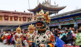 Monks perform Cham dance to pray for good harvest, peaceful life in Qinghai