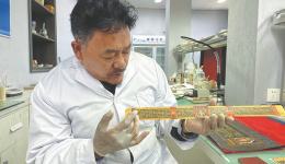 Palm-leaf scripture experts seek to master restoration