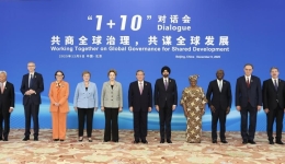 China to continue opening up its mega-market to world: premier