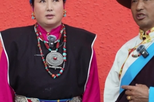 Performers from Bome County of Nyingchi introduce their costume and headwear