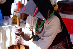 A demonstration of the traditional butter churning technique in Gymda County, Chamdo City, Xizang Autonomous Region